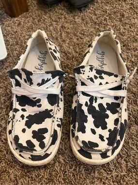 Gypsy Jazz Black and White Cow Print Slip-On Sneakers